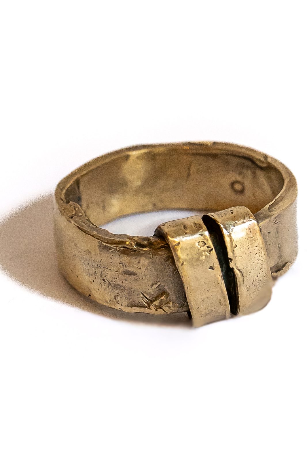Bronze ring with a crossed band